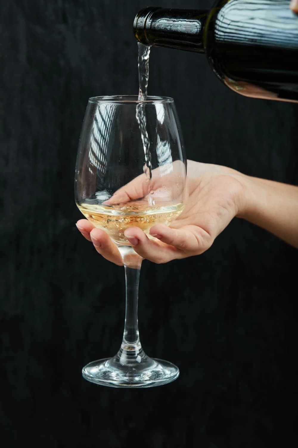 Pouring wine into glass