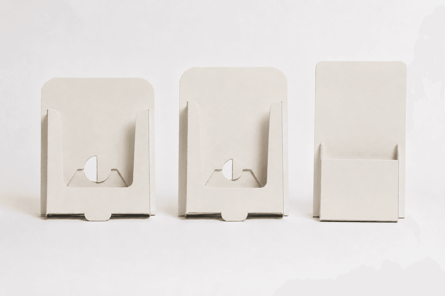 Cardboard brochure holders on a retail counter